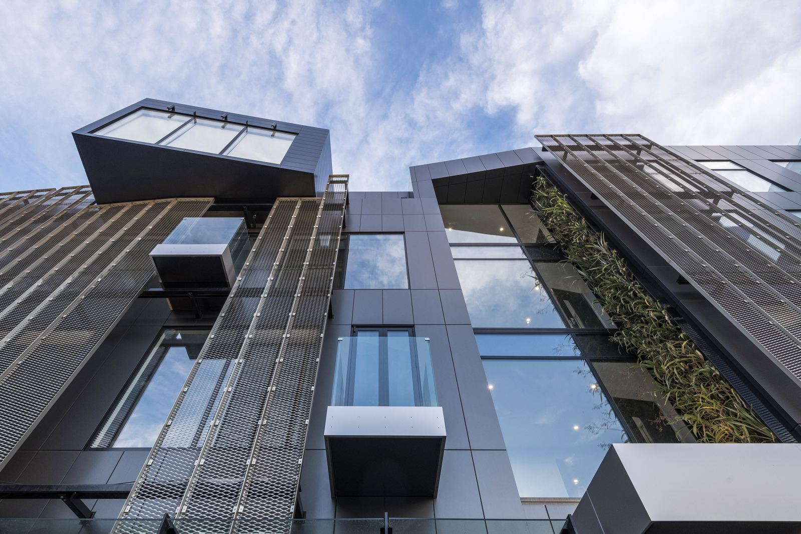 112 Cashel – Cashel Mall mixed-use building with bronze fins by AW Architects – image 4