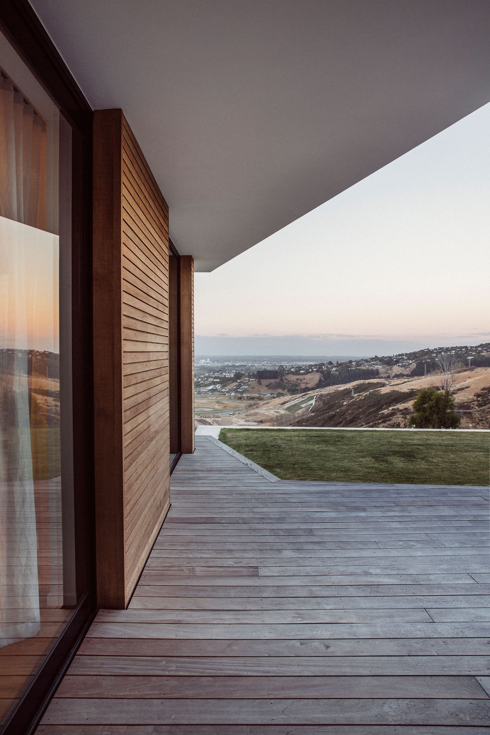 Worsley Spur, Cashmere – Port Hills house with bronze anodised upper level by AW Architects – image 4