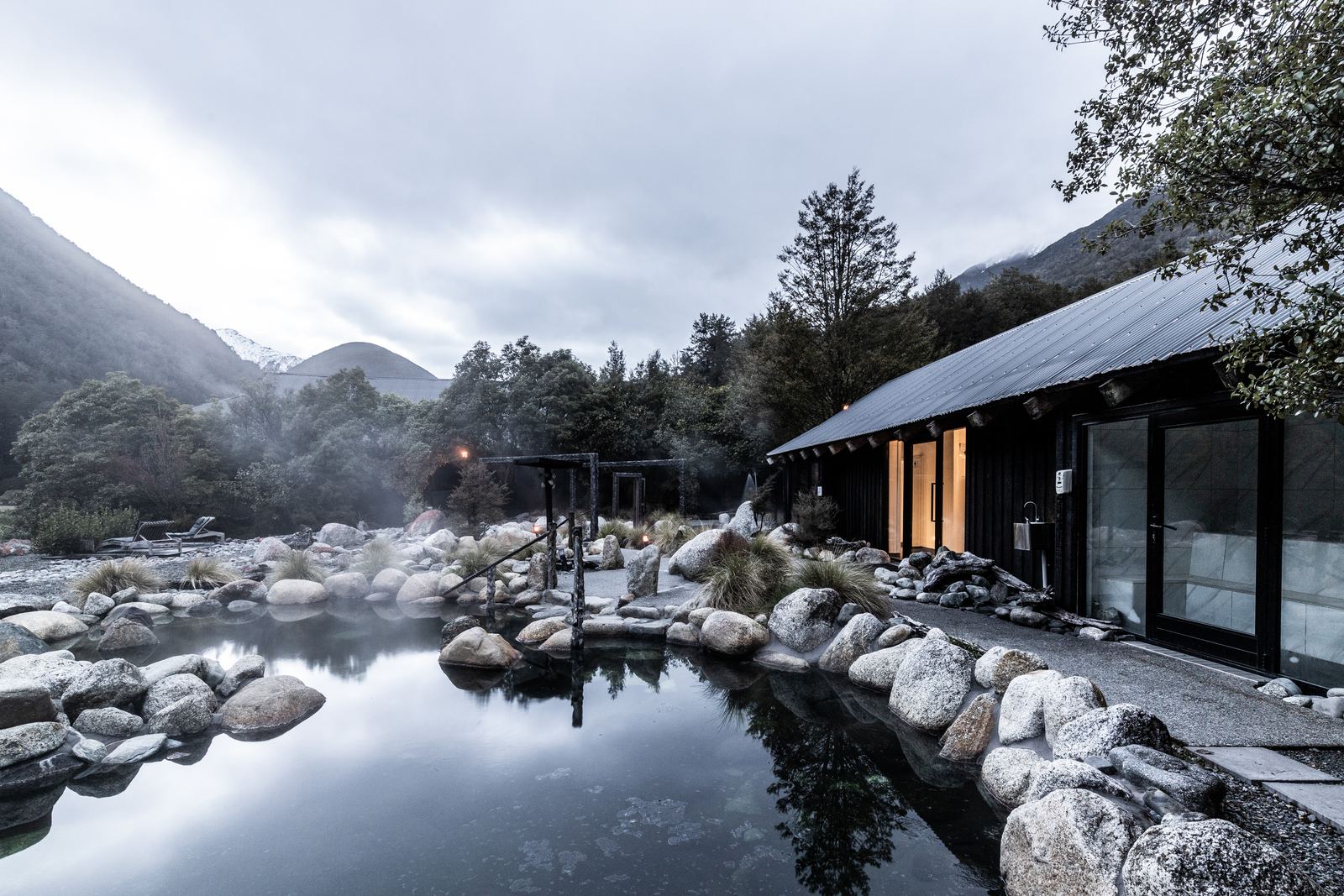 Maruia Hot Springs – alpine resort renovation with timber and stone interiors by AW Architects – image 4