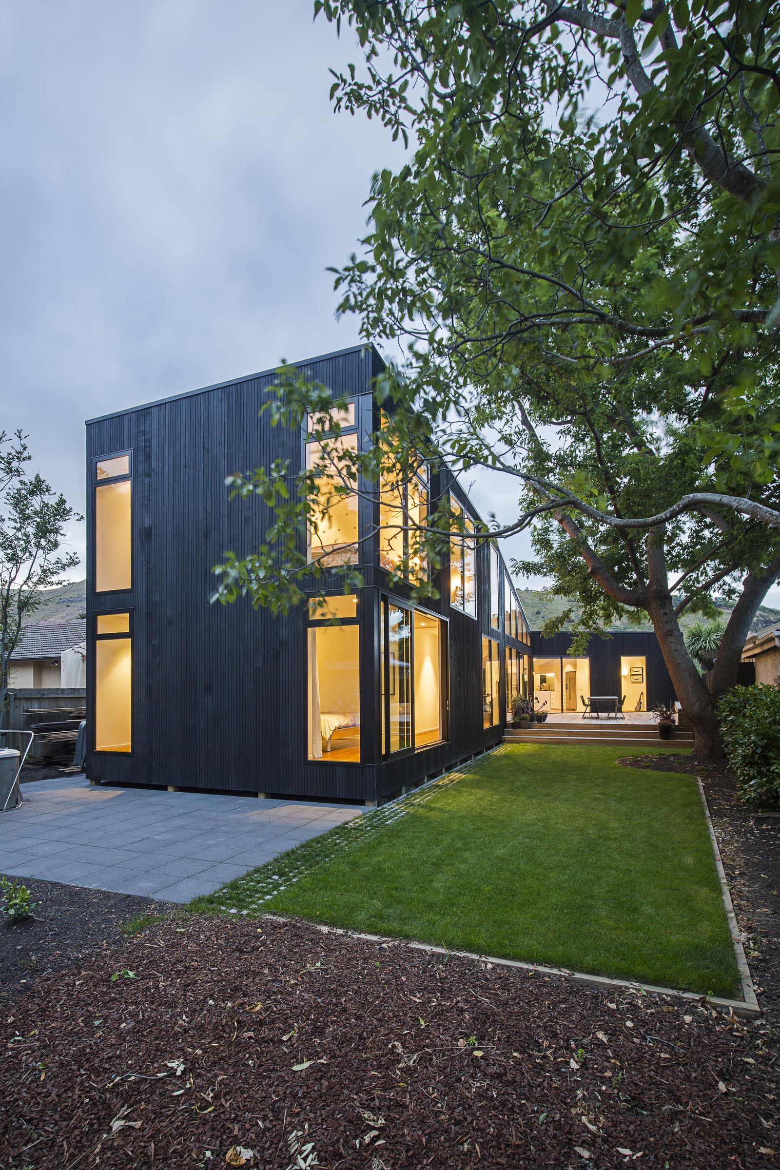 Clark St House, Sumner – rebuild home around a maple courtyard by AW Architects