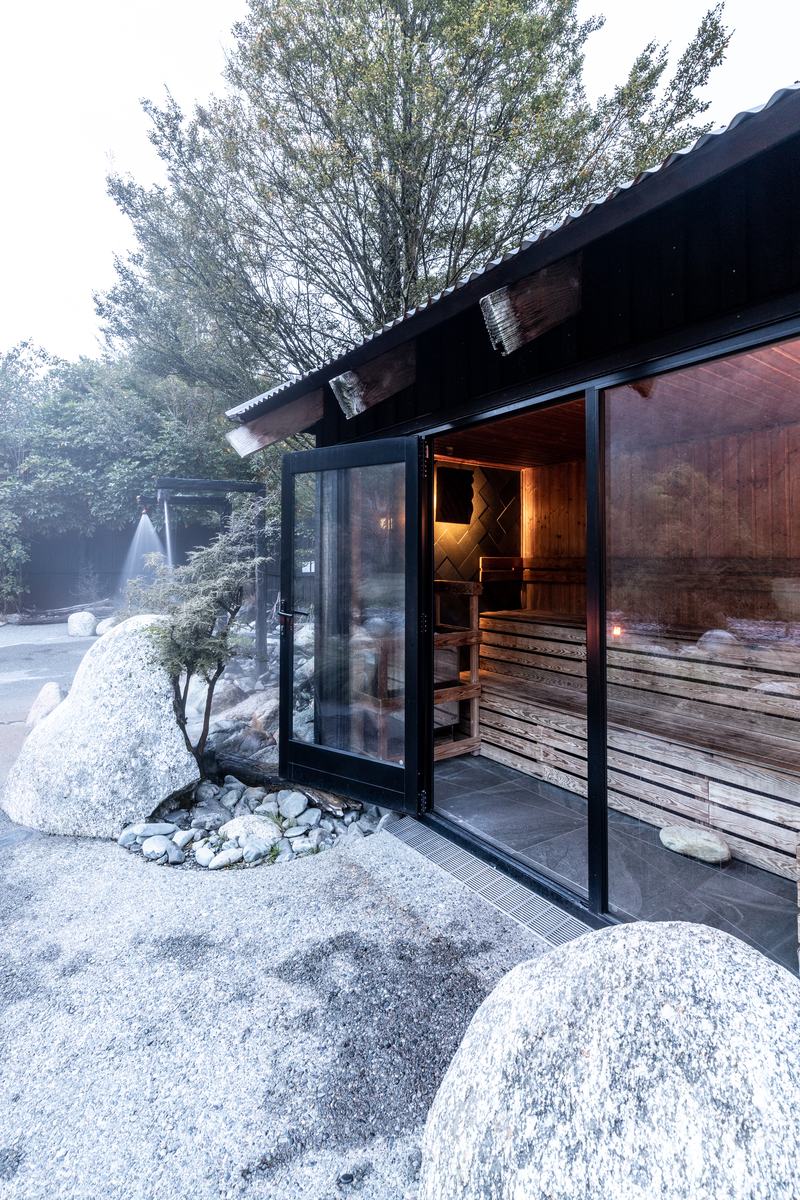 Maruia Hot Springs – alpine resort renovation with timber and stone interiors by AW Architects – image 2
