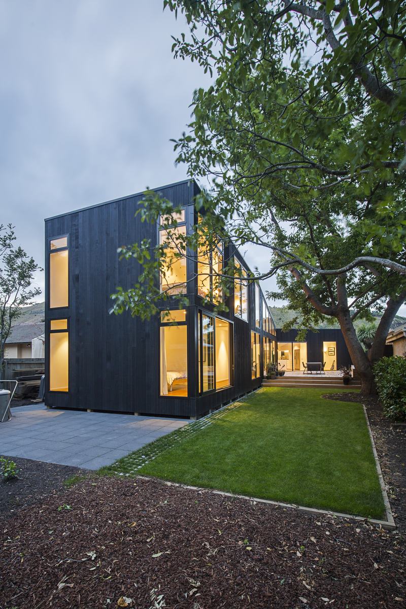 Clark St House, Sumner – rebuild home around a maple courtyard by AW Architects