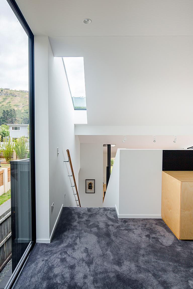 Clark St House, Sumner – rebuild home around a maple courtyard by AW Architects – image 11