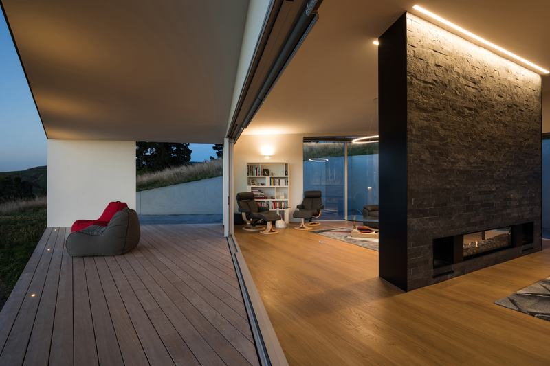 Tai Tapu House – sculptural Port Hills home with black cladding by AW Architects – image 5