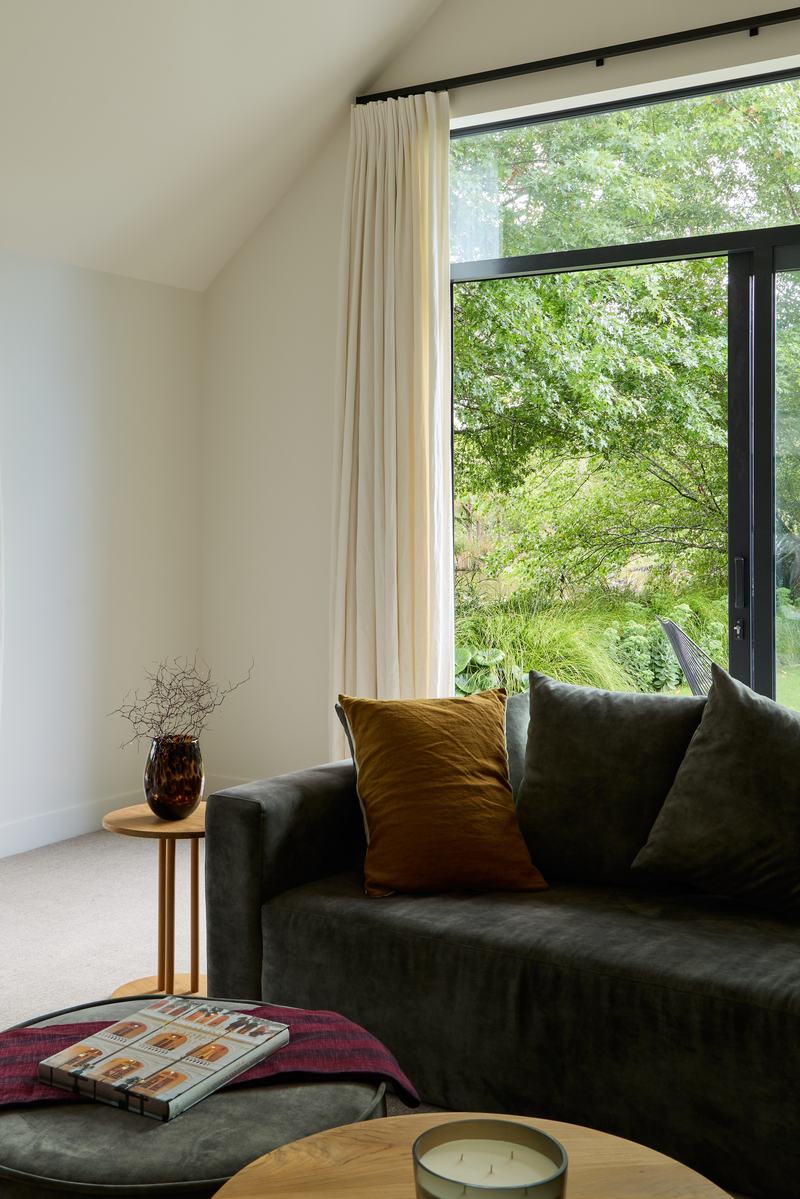 Tai Tapu lakeside home alteration with oak, cedar and clay plaster interiors by AW Architects – image 8