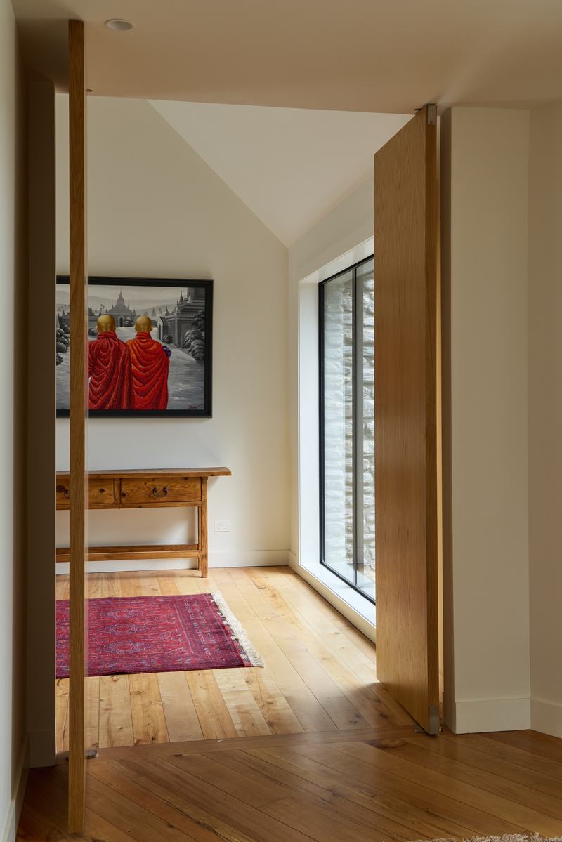 Tai Tapu lakeside home alteration with oak, cedar and clay plaster interiors by AW Architects – image 9